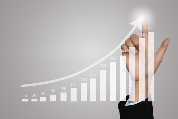businesswoman-pointing-growth-graph-business_41124-16